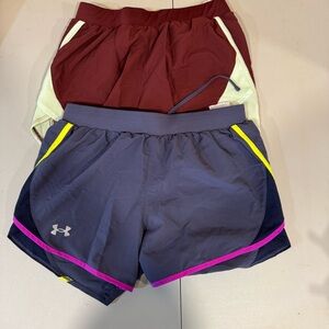 Under Armour Women's Running Shorts - 2 pairs- Burgundy and Steel Blue. Like new